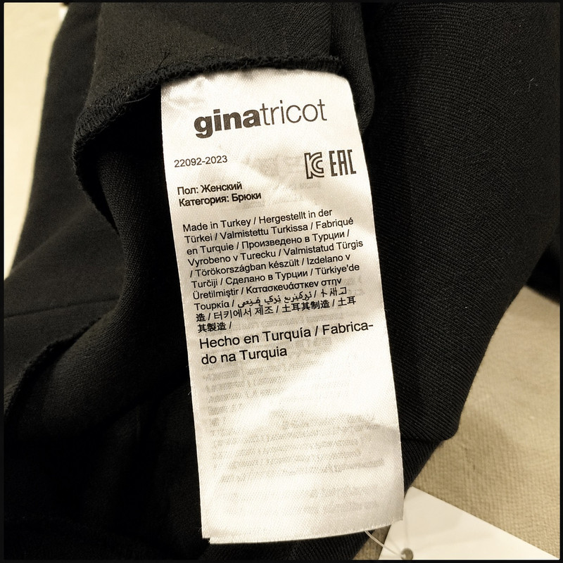 شلوار فیت راسته زنانه جیناتریکات مشکی چاک‌دار gi22902 - تصویر 9